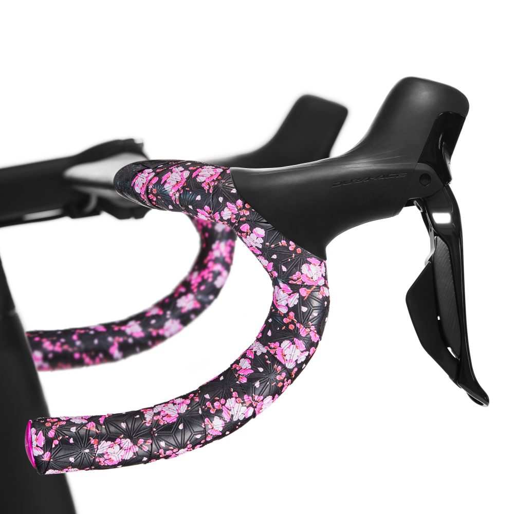 Cinta P/manivela De Ruta Supacaz Super Sticky Sakura Negro/rosado C/tapones Anod Rosado
